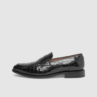 Goodyear welted men's shoes with stitched frames.
